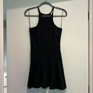 Donna Mizani little black dress
